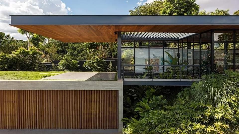 HPL exterior cladding and ceiling with natural wood finish for elevation, gate and boundary wall